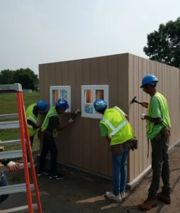 At the end of each MTA term, students work on one large community-based project. In summer 2021, Walker’s MTA class built a high school a ticket booth for sporting events. PC: C. Walker