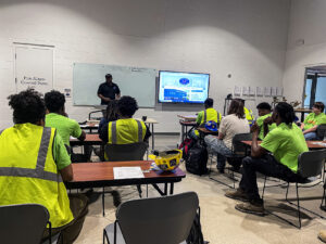 Terry Brathwaite presents to students in a classroom at Plumber's Local 15. 
