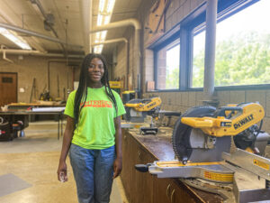Nicole Hard stands in the woodshop at White Bear Lake High School. 